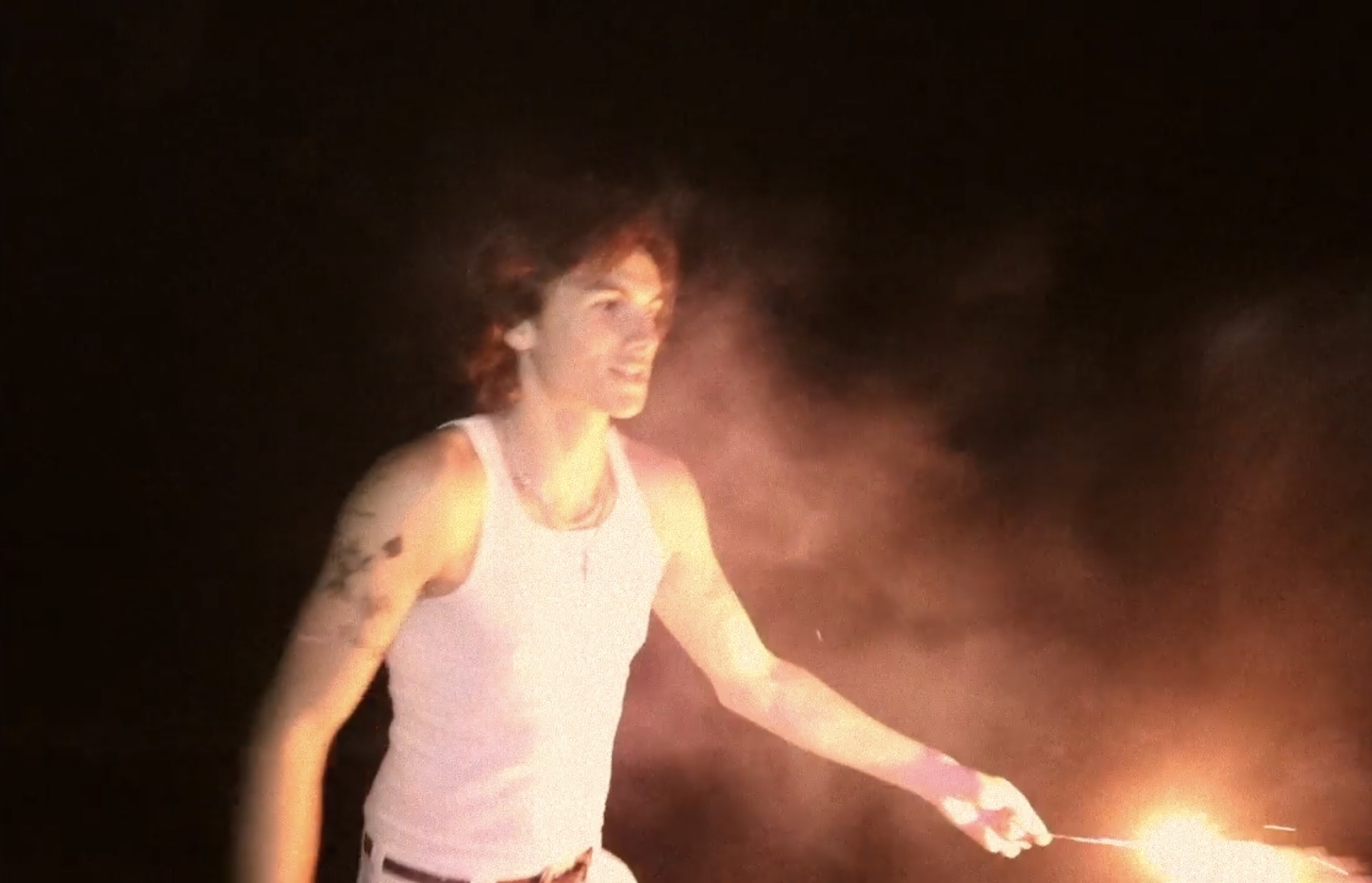 SLOWDOWN music video still, fire scene